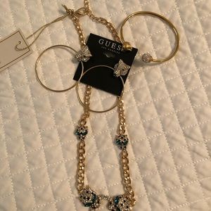 Necklace, earrings, and bracelet set.